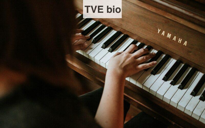 woman playing Yamaha piano